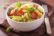 vegetarian pasta fusilli with tomato peas herbs