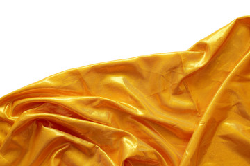 gold silk fabric on white background