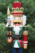 Nutcracker Soldier And Christmas Tree As A Background