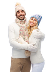 Sticker - smiling couple in winter clothes hugging