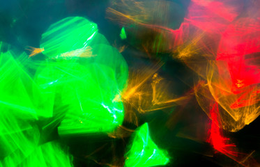Wall Mural - colorful night lights bokeh over dark background