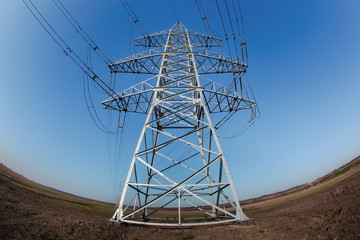 Power lines that passes through the fields