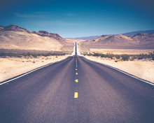 Open Road And Possibilities. Road In Death Valley National Park. Artistic Instagram Style Processing.