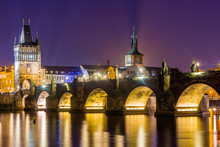View At The Charles Bridge And Vltava River In Prague In Dusk At Sunset, Czech Republic