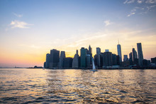 Sailing Boats At Dusk In Front Of Manhattan, New-york City