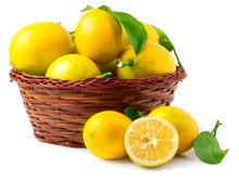 Lemons In Basket Isolated On White