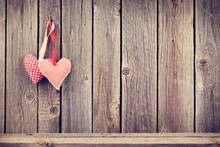 Two Valentines Day Hearts On Rustic Wooden Wall