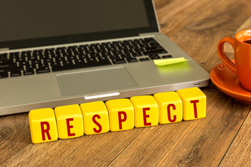 Wall Mural - Respect written on a wooden cube in a office desk