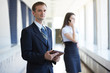 © photoniko - business woman with a telephone and a businessman with a tablet