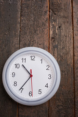 clock on a wooden wall