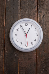 clock on a wooden wall