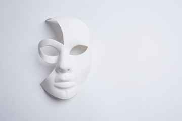 white venetian mask on a white background