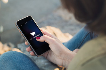 Wall Mural - woman touch the screen of her smartphone online shopping