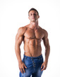 © theartofphoto - Attractive young man with naked muscular torso, wearing jeans