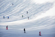 Skiers On The Slope Of A Ski Resort
