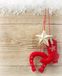 Cowboy christmas background with western toy boot and star on wo