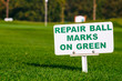 golf signs on grass