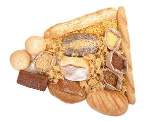 Poster - Composition of mixed breads, macaroni and grains on white background