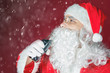 Santa Claus holding cola soda drink at Christmas