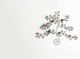 Fototapeta Desenie - Vintage Style Tree made from Steel in Gold Color with Rose and Bird at the Corner on White Wall Background with Copyspace used as Template
