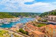 Leinwanddruck Bild - A view of Bonifacio port and old town, Corsica island, France