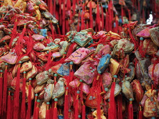 Amulet sachet bags hanging on a tree in China