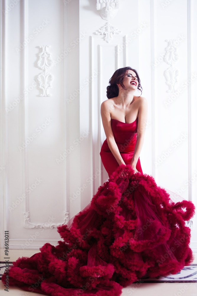 red dress beauty Beauty Brunette model woman in evening red dress. Beautiful fashion luxury  makeup and hairstyle, full length Stock Photo
