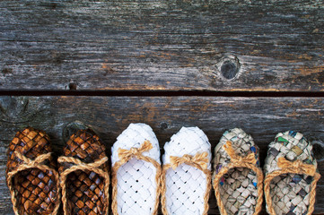 Bast shoes on a wooden background