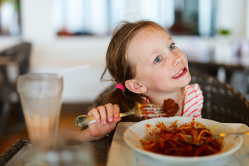 Canvas Print - Little girl eating spaghetti