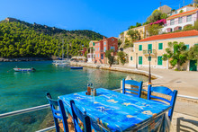 Table In Greek Tavern On Coast Of Kefalonia Island In Assos Fishing Village, Greece