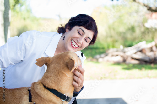 Fotografie, Obraz Closeup portrait, sweet moments healthcare professional in white lab coat with d