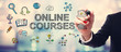 © Tierney - Businessman drawing Online courses concept