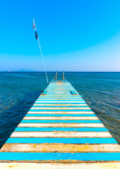 Wall Mural - Beautiful wooden pier at a beach in kefalos area in Kos island in Greece