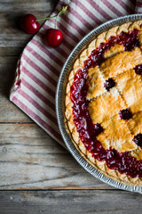 Wall Mural - Homemade cherry pie on rustic background