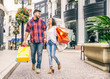 © oneinchpunch - Couple of lovers shopping outdoors