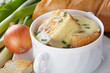 French cuisine. Onion soup served in a white tureen