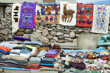 Wall Mural - Market stall with colorful indigenous tapestries