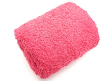 Pink Towel On A White Background
