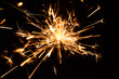 © Ievgenii Meyer - Christmas and New Year party sparkler on black