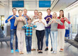 © Syda Productions - group of smiling people showing heart hand sign