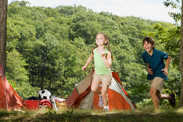 Kids playing near tents