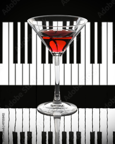 Naklejka nad blat kuchenny Red wine on a black and white piano background