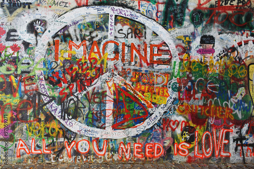 Colourfull peace graffiti on wall © PixieMe