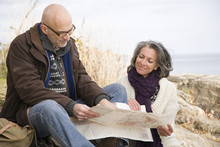 Mature Couple Looking At A Map