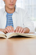 © xixinxing - Blind boy reading a braille book