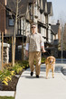 © xixinxing - Blind man with a golden retriever
