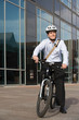 © xixinxing - Office worker on bicycle