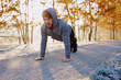 © baranq - Runner doing push ups during morning workout - healthy lifestyle