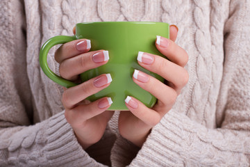 Fotomurales - Woman hands with elegant french manicure.