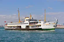 A Ferry Sails Into The Bosphorus, In The Background The Western